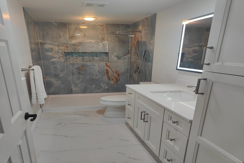 Custom Bathroom Remodeling and Walk-in Shower Services in San Antonio Modern custom bathroom remodeling project completed by JD Local Builders in San Antonio, TX, featuring a luxurious walk-in shower, high-end tile work, and professional bathroom renovation design.